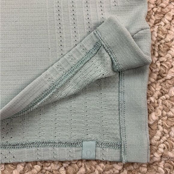 Lululemon women’s delicate green mint Train to Be Tank Top
Ventilation mesh - Picture 3 of 6